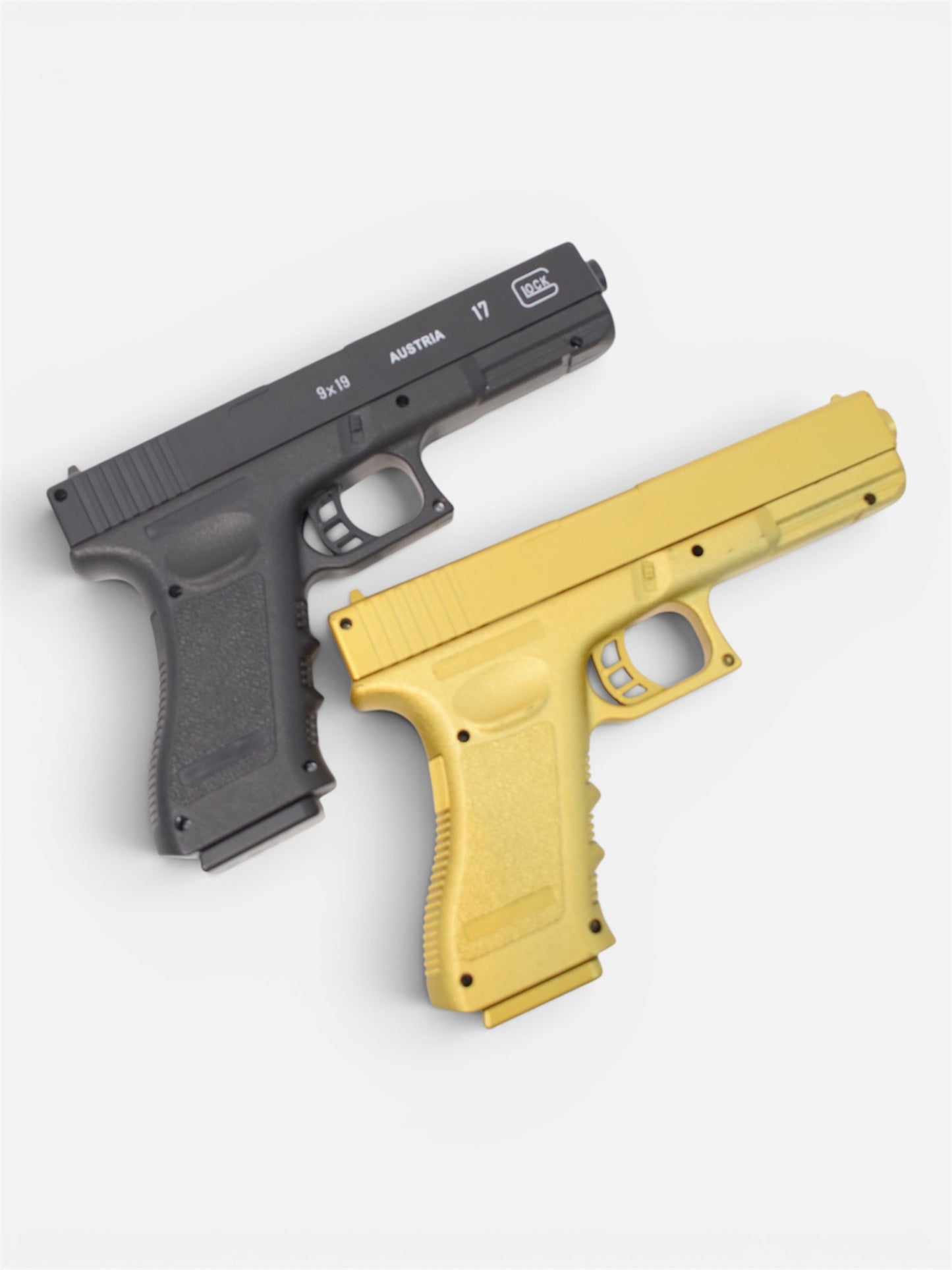 Pistola Negro Y Dorado