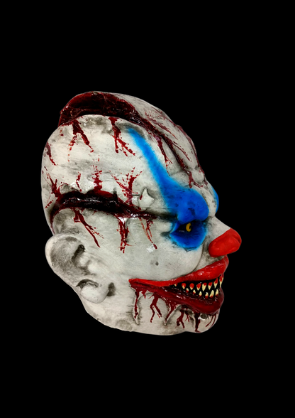 Payaso cabeza cortada