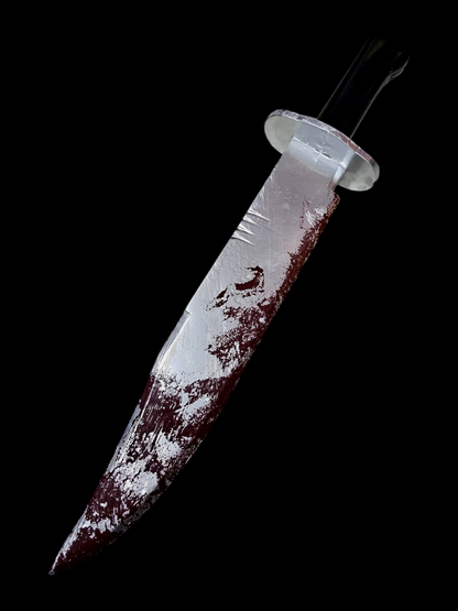 Cuchillo sangriento en Madera