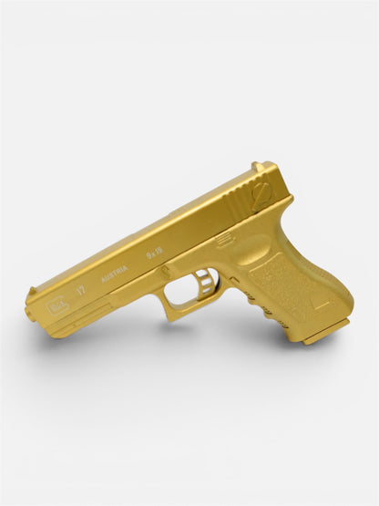 Pistola Negro Y Dorado